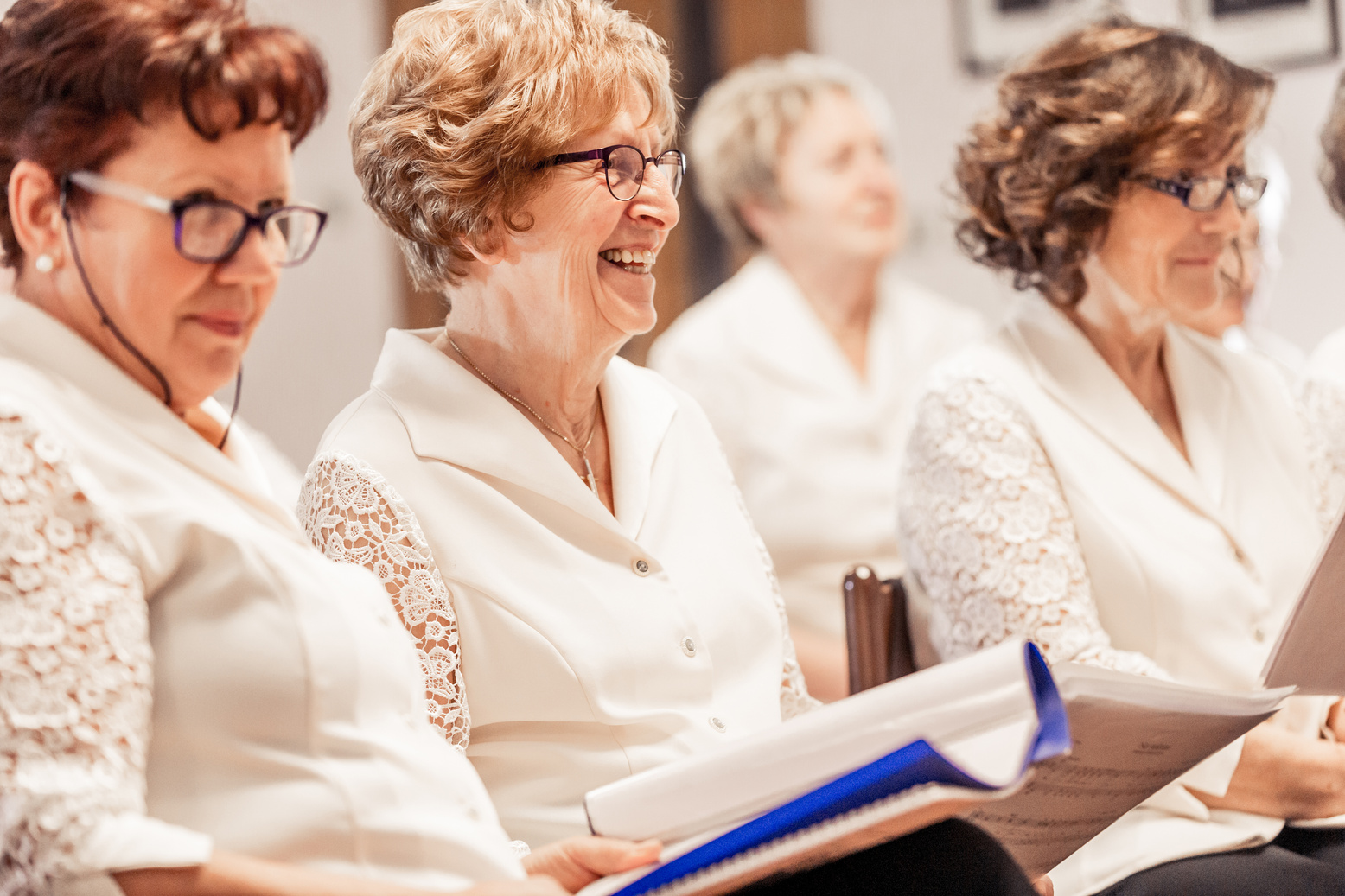 Senior Women Smiling At Choir Practice