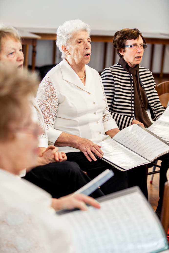Senior Women Singing at Choir Rehearsal